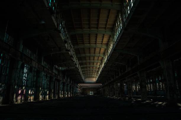istock Indoors of an old large abandoned facility 1440263706