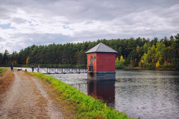 istock Small red hut built on a river and connected to a bridge with amazing natural scenery 1440266110