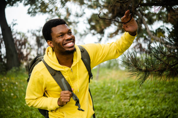 istock Portrait of a young backpacker exploring and enjoying his journey 1440266415