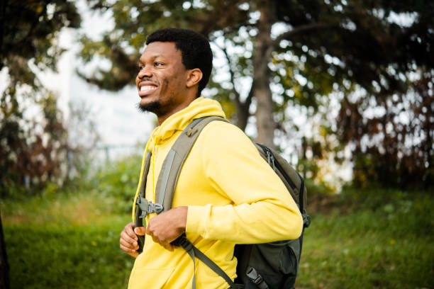 istock Young African American backpacker exploring new places 1440266416