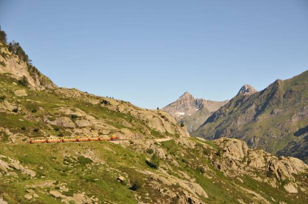 istock Low-angle of a landscape with Pic du Midi d'Ossau peak view, valleys covered with grass 1440266708