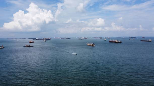 istock Areal image from Marina Barrage onto the sea with ships 1440267923