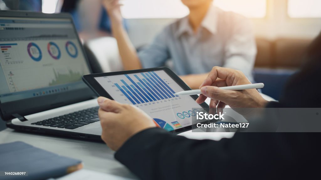Two businessman consult analyzing company financial cash flow result. Concept for teamwork business corporate meeting and economy fund. Finance Stock Photo