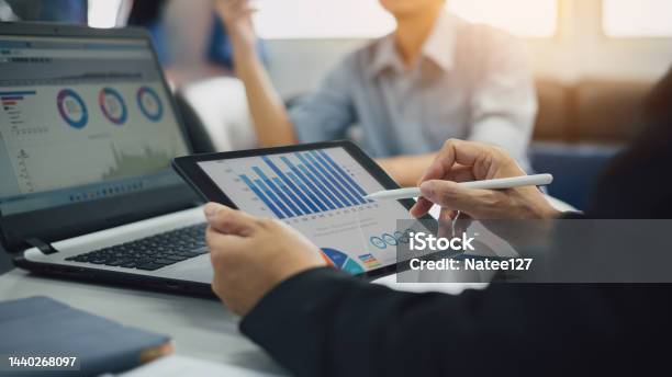 Two Businessman Consult Analyzing Company Financial Cash Flow Result Concept For Teamwork Business Corporate Meeting And Economy Fund Stock Photo - Download Image Now
