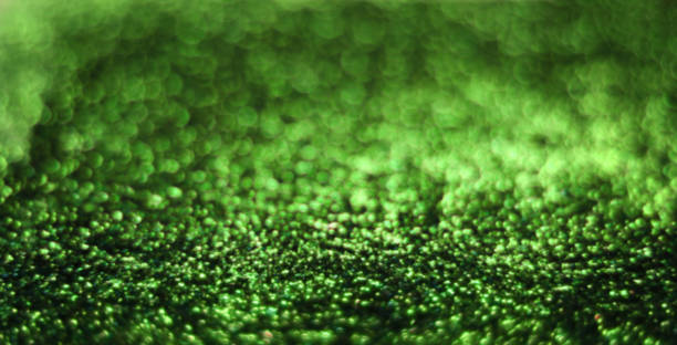 istock Green shiny aesthetic background 1440268542