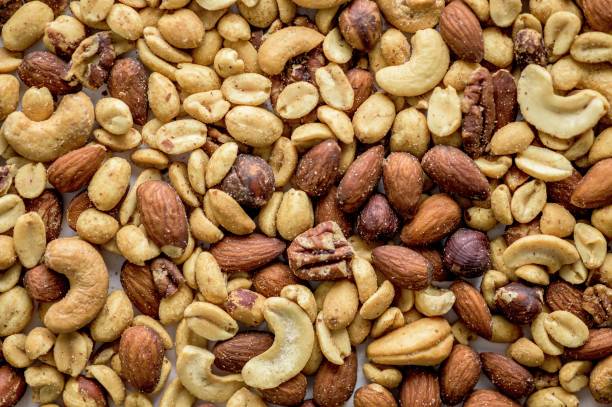 istock Overhead shot of different types of nuts - great for background 1440272735