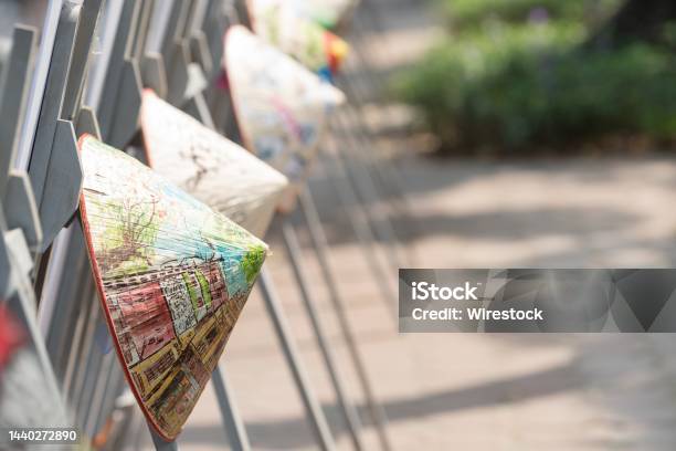 Closeup Shot Of Vietnamese Weaved Straw Coolies On A Blurred Background Stock Photo - Download Image Now