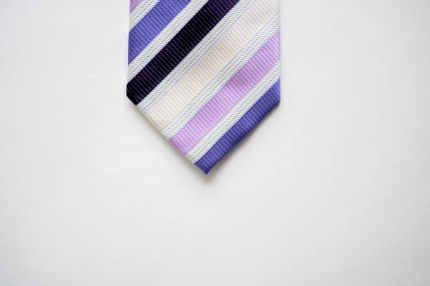istock Overhead shot of a striped tie on a white surface 1440273013