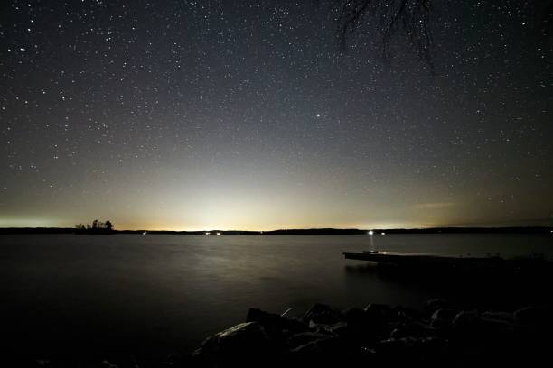 istock Lake reflecting the beautiful starry sky, perfect for wallpapers and backgrounds 1440273264