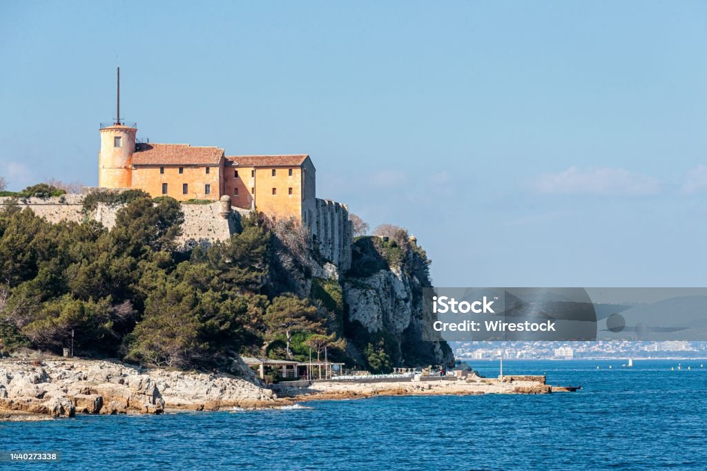 Low angle shot of the island Sainte marguerite Cannes in France, French Riviera A low angle shot of the island Sainte marguerite Cannes in France, French Riviera Cannes Stock Photo