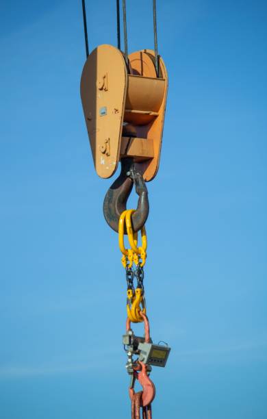 istock gantry crane with hook against blue sky 1440273830