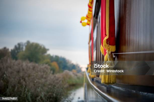 Closeup Selective Focus Shot Of Golden Tassels Hanging Over A Boat In Elburg Netherlands Stock Photo - Download Image Now