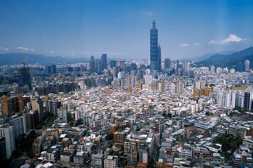 A high angle shot of a beautiful cityscape with a lot of buildings and high skyscrapers in Taipei, Taiwan