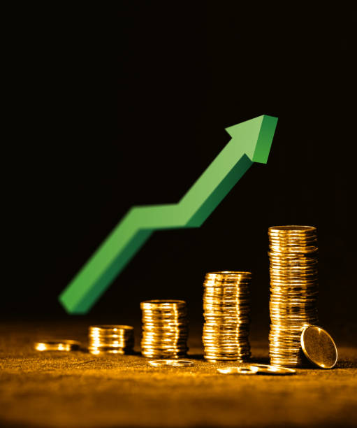 Wealth growth Golden coins isolated on black background gdp stock pictures, royalty-free photos & images