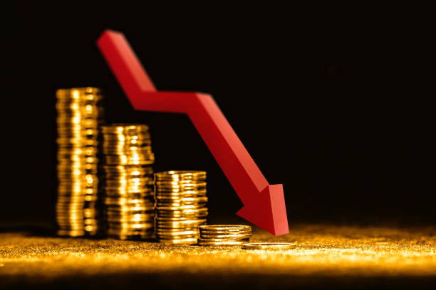 Wealth decline Golden coins isolated on black background gdp stock pictures, royalty-free photos & images