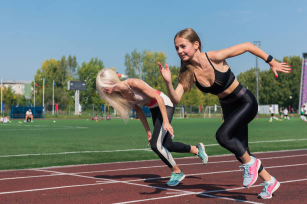 istock Two athlete woman runnner are training 1440276790