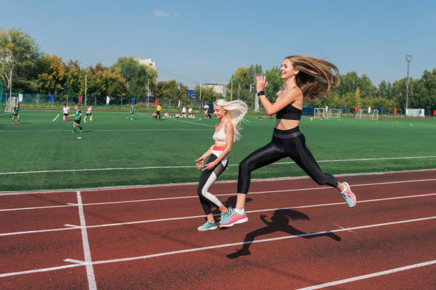 istock Two athlete woman runnner are training 1440276798