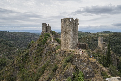 A breathtaking view of the Lastours Castels on the mountains captured in South of France