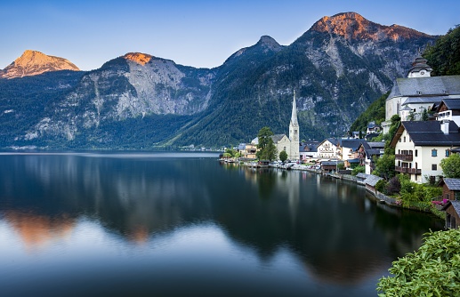 A beautiful shot of the Bad Goisern town in Austria near the lake during the sunset