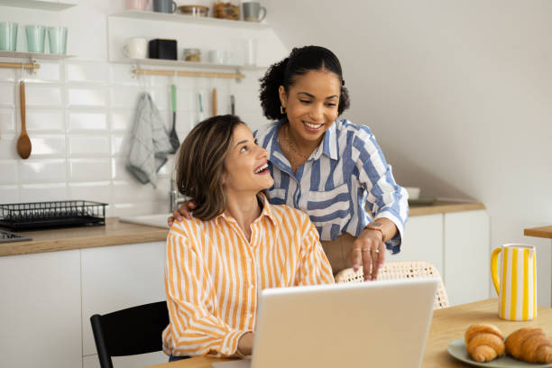 istock Two businesswomen cooperating at the home office 1440280547