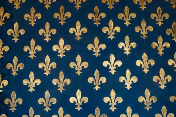 Photo of Blue wall with golden Fleur de Lys pattern, City Hall, Florence, Tuscany, Italy, Europe