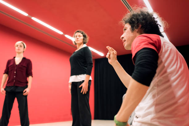 istock Theater students receiving instructions from their teacher during an exercise 1440281748