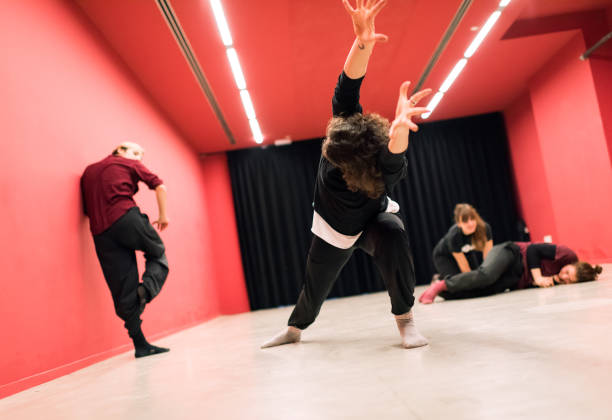 istock Theater students doing floor exercises and stretching 1440282006