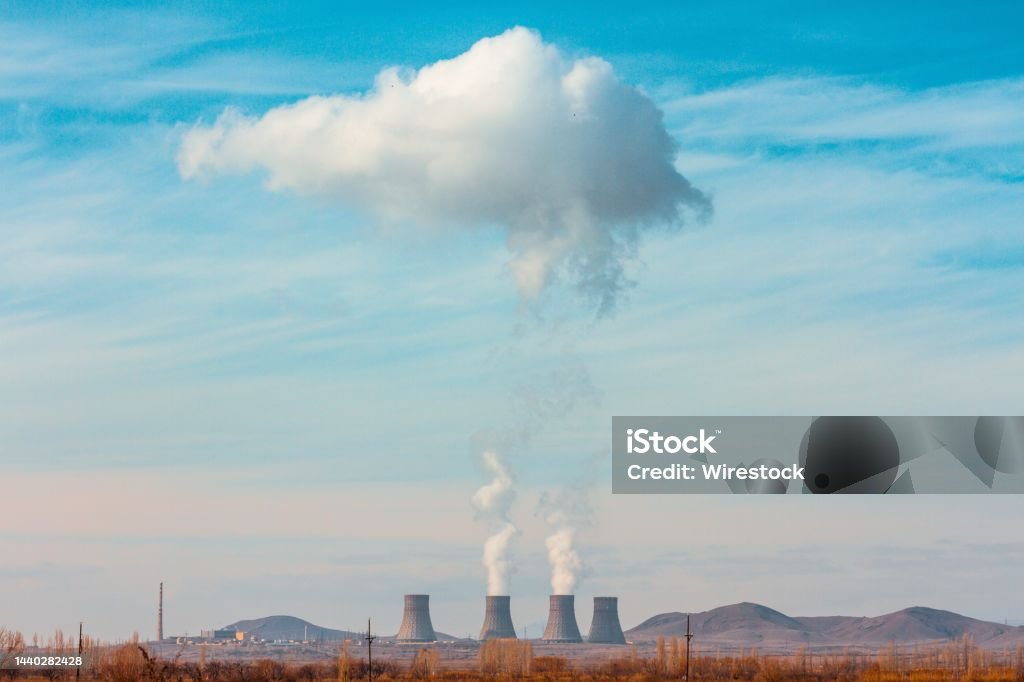 Metsamor Nuclear Power Plant surrounded by high mountains in Armenia The Metsamor Nuclear Power Plant surrounded by high mountains in Armenia - puts an emphasis on air pollution Atom Stock Photo
