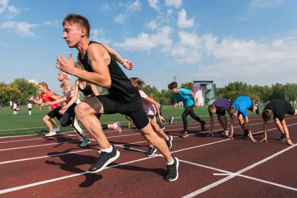 Photo of Group of young athlete runnner are training