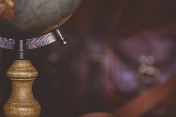 istock Closeup shot of a desk globe with a blurred background 1440284638