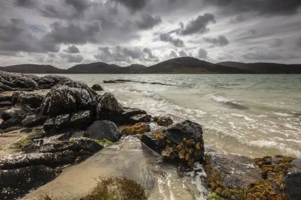 A dark scenery of a sea shore on a glomy day in Isle of Lewis, Outer Hebrides, Scotland, UK