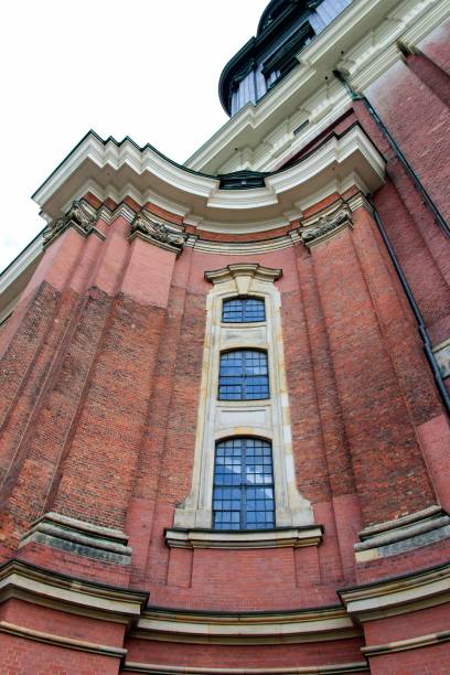 istock Vertical low angle shot of a red building under the clear sky during daytime 1440289100