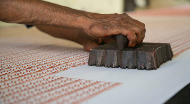 Manual fabric stamping process in Jaipur in India.