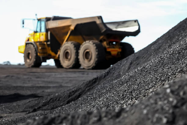 istock Open-pit manganese mining industry on blurred background of a machine 1440290964