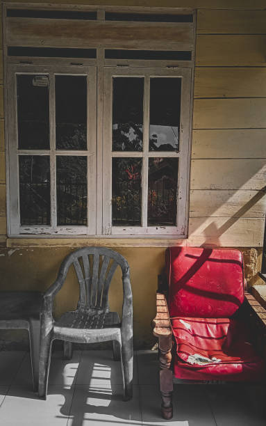 istock The white window and a different chair 1440291654