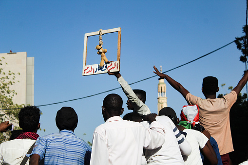 Khartoum, Sudan – December 19, 2019: People celebrating the first anniversary of the revolution by he Constitutional Court and inside Liberty SquareThey ask retribution for the martyrs.