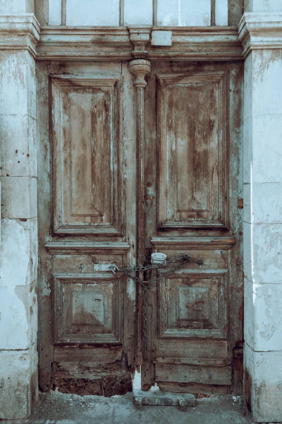 istock Very old obsolete wooden door 1440292709