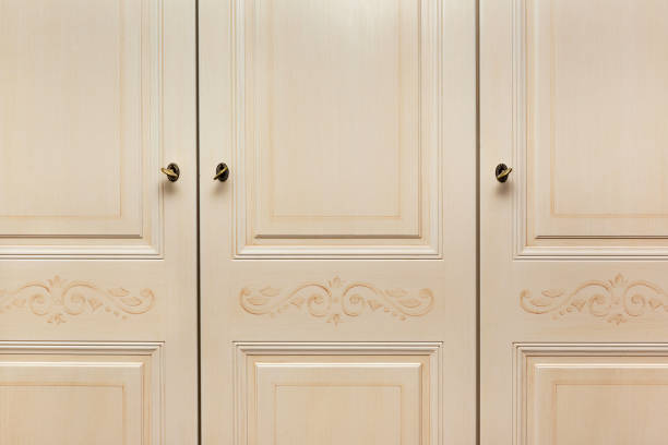 istock Front wooden frame of door cabinet with pattern. 1440302179