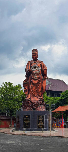 Statue of Monk and emperor in the Sam Poo Kong Temple area of Semarang. stock photo
