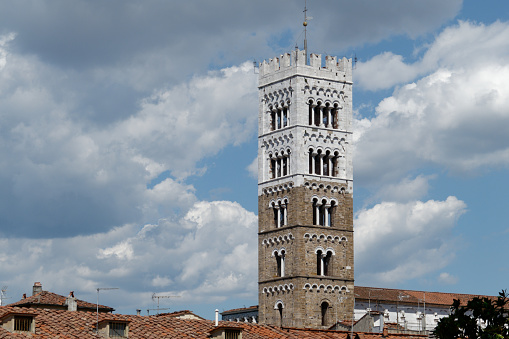 Bell tower of Roman Catholic Cathedral of San Martino . Lucca, Italy