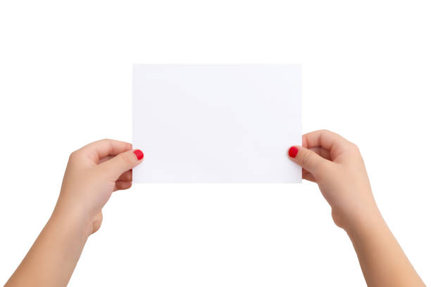 istock Isolated female hands and blank paper for copy presentation 1440305323