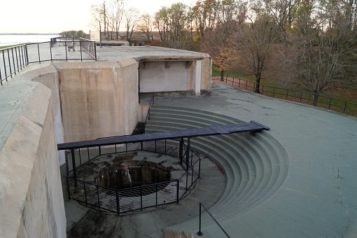 Coastal artillery disappearing gun emplacement of the Battery Arnold at Fort Mott, view in sunset dusk, Pennsville Township, NJ, USA