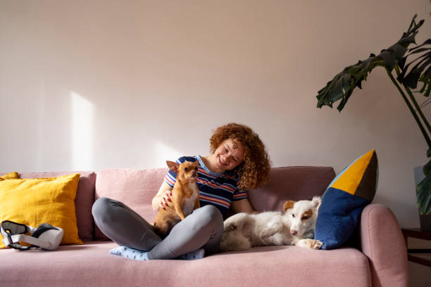 istock Woman with VR relaxing at home 1440308582