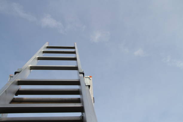 istock A man is trying to get up the ladder 1440311415