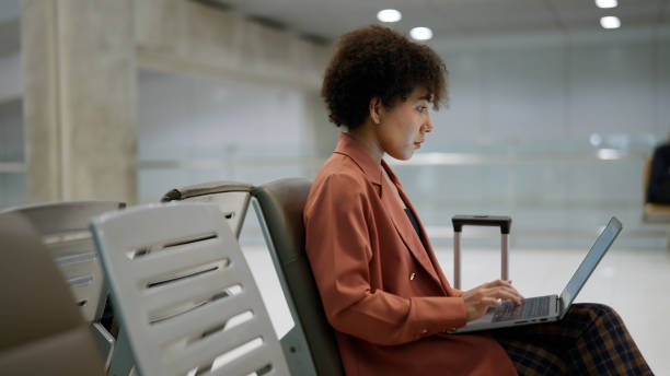 istock Asian woman working hard in airport 1440311507