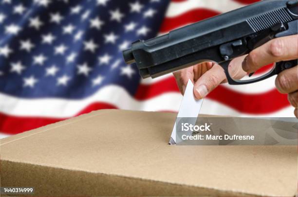 Man Putting Usa Voting Card In Ballot Box Stock Photo - Download Image Now - Adult, Adults Only, American Flag