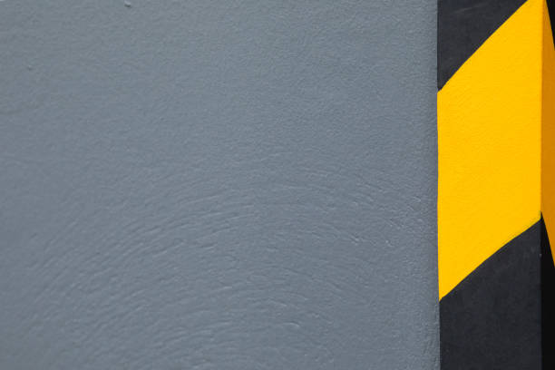 istock Yellow and black warning edge at wall 1440322475