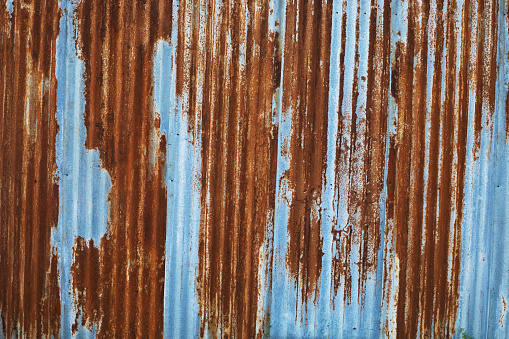 Grunged and rusty metal sheets wall