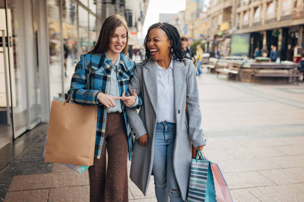 istock Two women enjoy their favorite weekend activity - shopping 1440326684