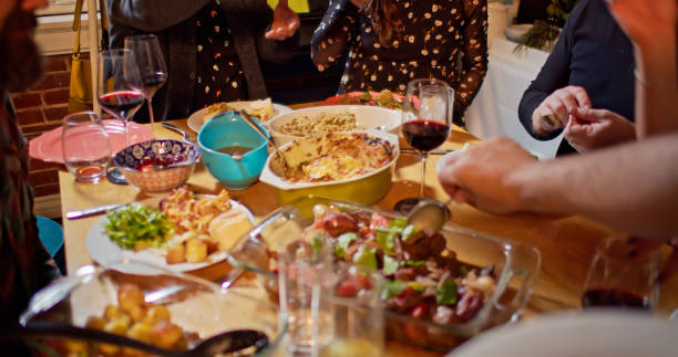 istock Serving Food at Dinner Party 1440328266